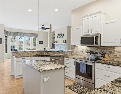 Beautifully updated ranch with a fully finished basement in a on Highland Meadows Golf Course in Colorado - for sale on GolfHomes.com, golf home, golf lot