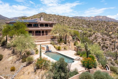 Like two homes in one! Sensational city light and mountain views on Desert Mountain Club - Apache Golf Course in Arizona - for sale on GolfHomes.com, golf home, golf lot