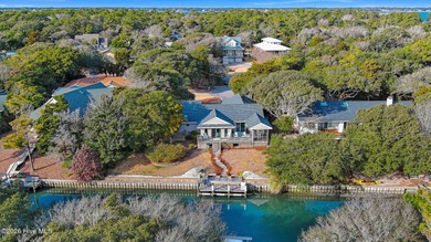 Recently renovated 3-bedroom, 4 bath waterfront home in Pine on The Country Club of the Crystal Coast in North Carolina - for sale on GolfHomes.com, golf home, golf lot