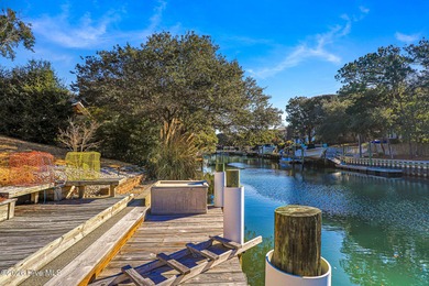 Recently renovated 3-bedroom, 4 bath waterfront home in Pine on The Country Club of the Crystal Coast in North Carolina - for sale on GolfHomes.com, golf home, golf lot