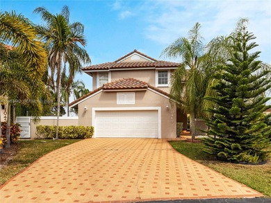 Rare Lakefront Pool Home in Doral Dunes at Doral Park! This on Jim McLean Signature Course in Florida - for sale on GolfHomes.com, golf home, golf lot