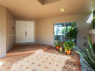 Rare Lakefront Pool Home in Doral Dunes at Doral Park! This on Jim McLean Signature Course in Florida - for sale on GolfHomes.com, golf home, golf lot