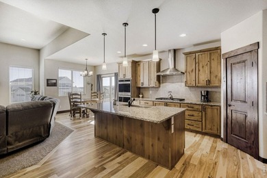 Experience refined Colorado living in this stunning Hudson model on Raindance National Golf Course in Colorado - for sale on GolfHomes.com, golf home, golf lot