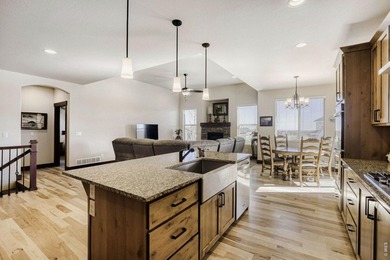 Experience refined Colorado living in this stunning Hudson model on Raindance National Golf Course in Colorado - for sale on GolfHomes.com, golf home, golf lot