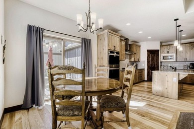 Experience refined Colorado living in this stunning Hudson model on Raindance National Golf Course in Colorado - for sale on GolfHomes.com, golf home, golf lot