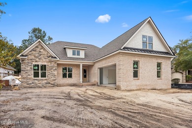 Located on a quiet cul-de-sac street within the Thistle Downs on Thistle Golf Club in North Carolina - for sale on GolfHomes.com, golf home, golf lot