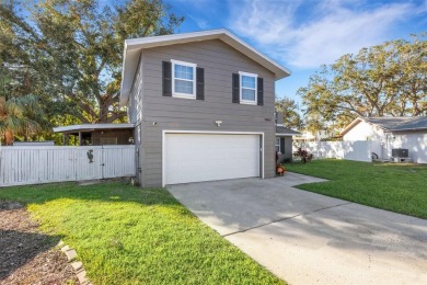 Step inside this meticulously kept, three bedroom, two and a on Baypoint Golf Club in Florida - for sale on GolfHomes.com, golf home, golf lot