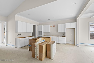 Located on a quiet cul-de-sac street within the Thistle Downs on Thistle Golf Club in North Carolina - for sale on GolfHomes.com, golf home, golf lot