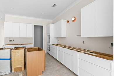 Located on a quiet cul-de-sac street within the Thistle Downs on Thistle Golf Club in North Carolina - for sale on GolfHomes.com, golf home, golf lot