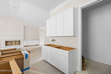 Located on a quiet cul-de-sac street within the Thistle Downs on Thistle Golf Club in North Carolina - for sale on GolfHomes.com, golf home, golf lot