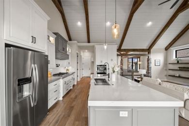 This home offers everything you want--luxury upgrades new on Fred Arbanas Golf Course At Longview Lakes - Longview Lake in Missouri - for sale on GolfHomes.com, golf home, golf lot