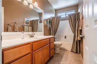 Listing courtesy of Lori Robinson, Coldwell Banker ABR on Menifee Lakes Country Club - Lakes in California - for sale on GolfHomes.com, golf home, golf lot