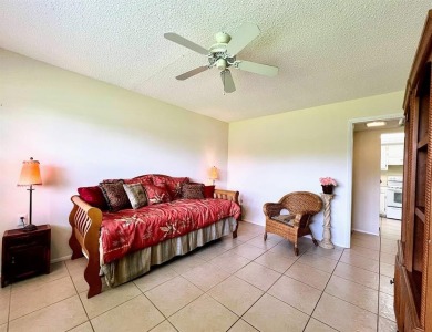 Lovely light  bright 2 bedroom / 2 bathroom corner unit in the on Wynmoor Golf Course in Florida - for sale on GolfHomes.com, golf home, golf lot