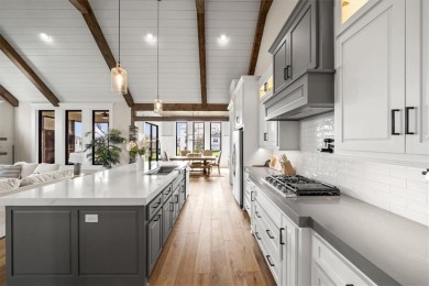 This home offers everything you want--luxury upgrades new on Fred Arbanas Golf Course At Longview Lakes - Longview Lake in Missouri - for sale on GolfHomes.com, golf home, golf lot
