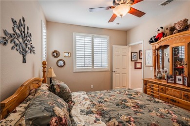Listing courtesy of Lori Robinson, Coldwell Banker ABR on Menifee Lakes Country Club - Lakes in California - for sale on GolfHomes.com, golf home, golf lot