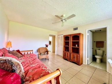 Lovely light  bright 2 bedroom / 2 bathroom corner unit in the on Wynmoor Golf Course in Florida - for sale on GolfHomes.com, golf home, golf lot