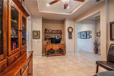 Listing courtesy of Lori Robinson, Coldwell Banker ABR on Menifee Lakes Country Club - Lakes in California - for sale on GolfHomes.com, golf home, golf lot
