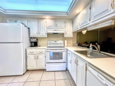 Lovely light  bright 2 bedroom / 2 bathroom corner unit in the on Wynmoor Golf Course in Florida - for sale on GolfHomes.com, golf home, golf lot