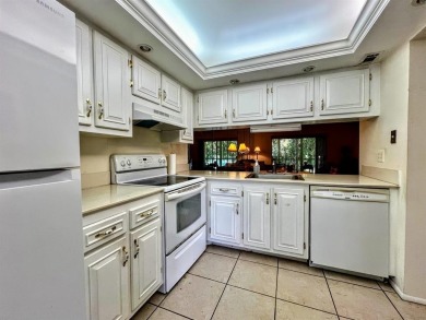 Lovely light  bright 2 bedroom / 2 bathroom corner unit in the on Wynmoor Golf Course in Florida - for sale on GolfHomes.com, golf home, golf lot