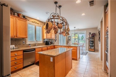 Listing courtesy of Lori Robinson, Coldwell Banker ABR on Menifee Lakes Country Club - Lakes in California - for sale on GolfHomes.com, golf home, golf lot
