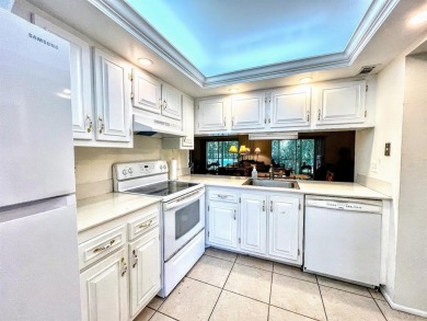 Lovely light  bright 2 bedroom / 2 bathroom corner unit in the on Wynmoor Golf Course in Florida - for sale on GolfHomes.com, golf home, golf lot
