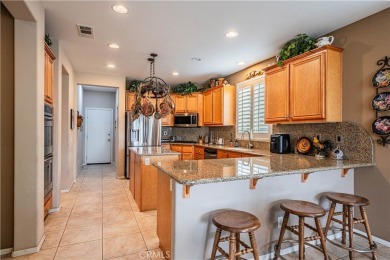 Listing courtesy of Lori Robinson, Coldwell Banker ABR on Menifee Lakes Country Club - Lakes in California - for sale on GolfHomes.com, golf home, golf lot