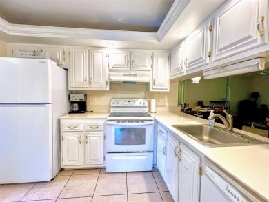 Lovely light  bright 2 bedroom / 2 bathroom corner unit in the on Wynmoor Golf Course in Florida - for sale on GolfHomes.com, golf home, golf lot