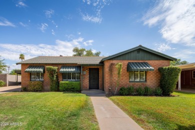 Come see this charming, mid-century 3BR/2BA, natural brick home on Encanto 18 Golf Course in Arizona - for sale on GolfHomes.com, golf home, golf lot