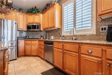 Listing courtesy of Lori Robinson, Coldwell Banker ABR on Menifee Lakes Country Club - Lakes in California - for sale on GolfHomes.com, golf home, golf lot
