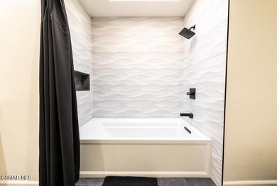 Tastefully remodeled and fully furnished, this stunning home on North Ranch Country Club in California - for sale on GolfHomes.com, golf home, golf lot