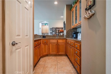Listing courtesy of Lori Robinson, Coldwell Banker ABR on Menifee Lakes Country Club - Lakes in California - for sale on GolfHomes.com, golf home, golf lot