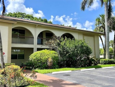 Lovely light  bright 2 bedroom / 2 bathroom corner unit in the on Wynmoor Golf Course in Florida - for sale on GolfHomes.com, golf home, golf lot