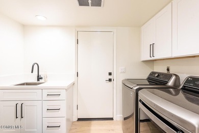 Tastefully remodeled and fully furnished, this stunning home on North Ranch Country Club in California - for sale on GolfHomes.com, golf home, golf lot