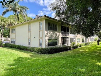 Lovely light  bright 2 bedroom / 2 bathroom corner unit in the on Wynmoor Golf Course in Florida - for sale on GolfHomes.com, golf home, golf lot