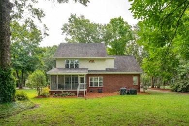 Nestled in the tranquil Stono Ferry community, this home boasts on The Links at Stono Ferry in South Carolina - for sale on GolfHomes.com, golf home, golf lot