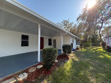 This 1560 square foot home has a unique very spacious floor on Whisperwood Golf Course in Florida - for sale on GolfHomes.com, golf home, golf lot