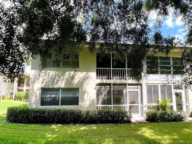 Lovely light  bright 2 bedroom / 2 bathroom corner unit in the on Wynmoor Golf Course in Florida - for sale on GolfHomes.com, golf home, golf lot