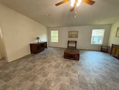 This 1560 square foot home has a unique very spacious floor on Whisperwood Golf Course in Florida - for sale on GolfHomes.com, golf home, golf lot