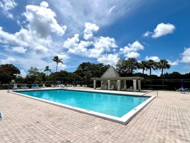 Lovely light  bright 2 bedroom / 2 bathroom corner unit in the on Wynmoor Golf Course in Florida - for sale on GolfHomes.com, golf home, golf lot