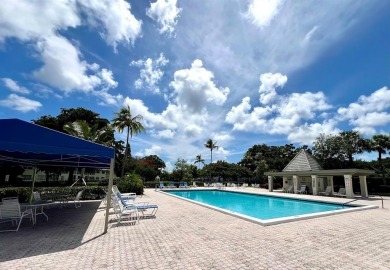 Lovely light  bright 2 bedroom / 2 bathroom corner unit in the on Wynmoor Golf Course in Florida - for sale on GolfHomes.com, golf home, golf lot