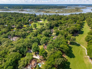 Nestled in the tranquil Stono Ferry community, this home boasts on The Links at Stono Ferry in South Carolina - for sale on GolfHomes.com, golf home, golf lot