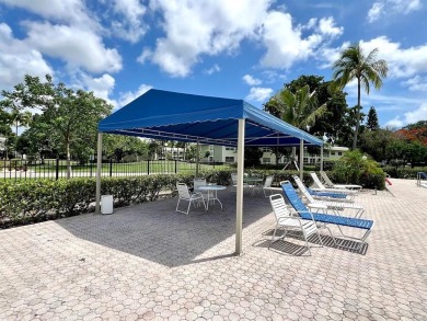 Lovely light  bright 2 bedroom / 2 bathroom corner unit in the on Wynmoor Golf Course in Florida - for sale on GolfHomes.com, golf home, golf lot