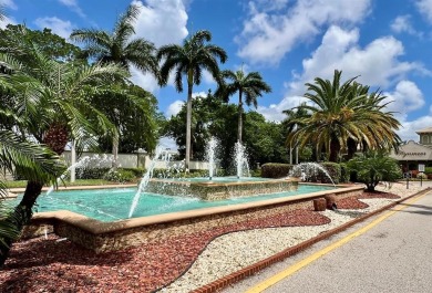Lovely light  bright 2 bedroom / 2 bathroom corner unit in the on Wynmoor Golf Course in Florida - for sale on GolfHomes.com, golf home, golf lot