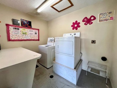 Lovely light  bright 2 bedroom / 2 bathroom corner unit in the on Wynmoor Golf Course in Florida - for sale on GolfHomes.com, golf home, golf lot