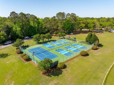 Nestled in the tranquil Stono Ferry community, this home boasts on The Links at Stono Ferry in South Carolina - for sale on GolfHomes.com, golf home, golf lot