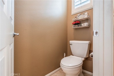 Listing courtesy of Lori Robinson, Coldwell Banker ABR on Menifee Lakes Country Club - Lakes in California - for sale on GolfHomes.com, golf home, golf lot