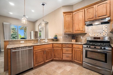 This stunning custom built ranch home in highly sought after on Highland Meadows Golf Course in Colorado - for sale on GolfHomes.com, golf home, golf lot