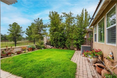 Listing courtesy of Lori Robinson, Coldwell Banker ABR on Menifee Lakes Country Club - Lakes in California - for sale on GolfHomes.com, golf home, golf lot