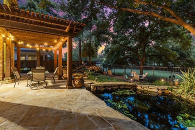 ENTERTAINERS DREAM HOME WITH RESORT-LIKE BACKYARD OASIS, IDEALLY on Timarron Country Club in Texas - for sale on GolfHomes.com, golf home, golf lot