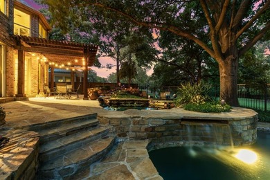 ENTERTAINERS DREAM HOME WITH RESORT-LIKE BACKYARD OASIS, IDEALLY on Timarron Country Club in Texas - for sale on GolfHomes.com, golf home, golf lot
